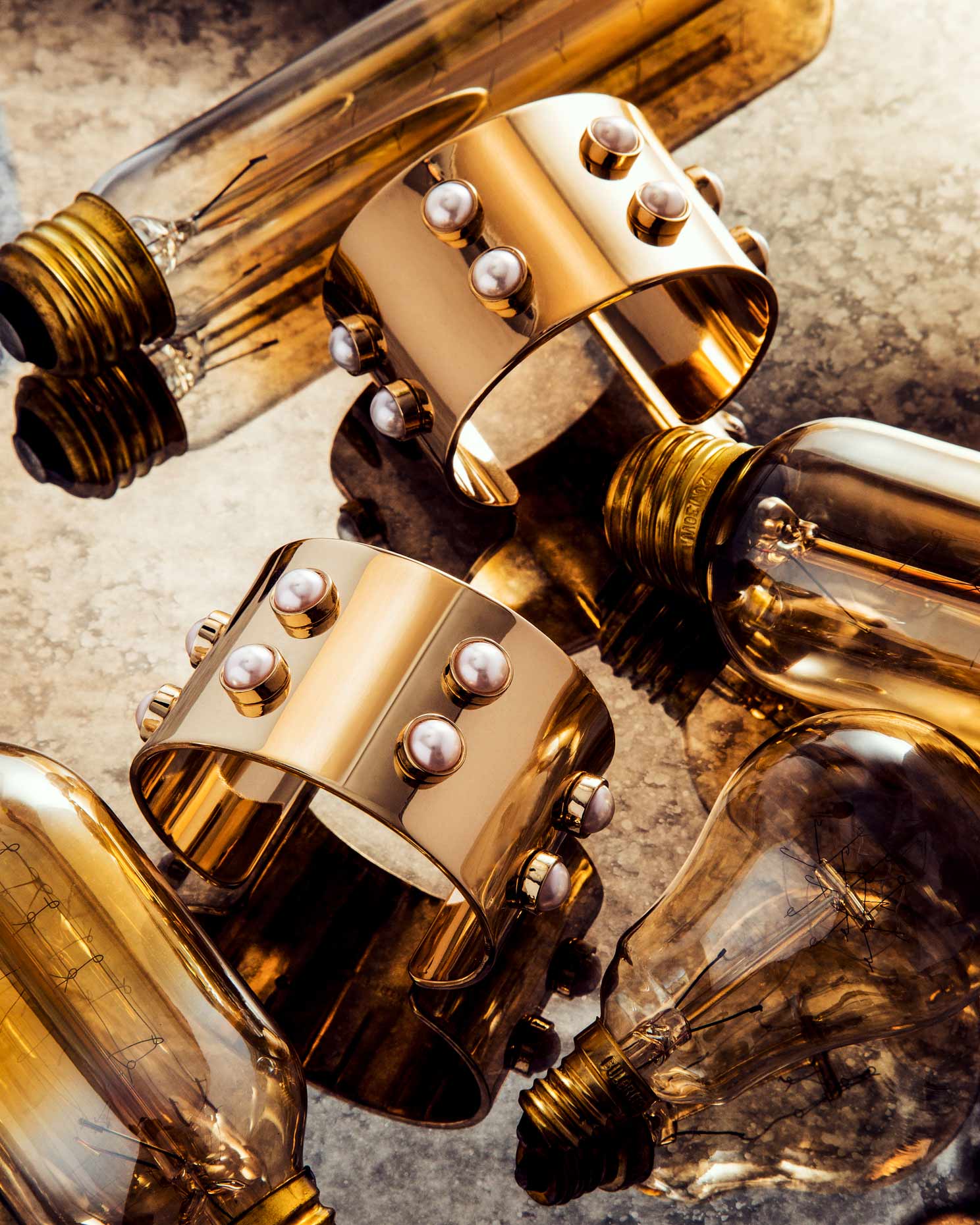 Jewelry-Gold-Llightbulbs-Cuffs-Rick-Holbrook-Photography